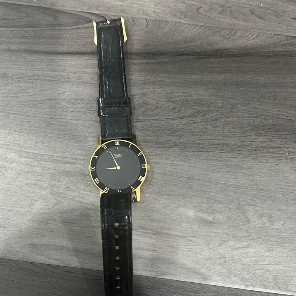Pulsar Women's Black and Gold Watch